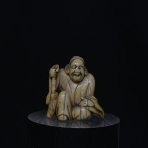 Netsuke Elder seal ivory