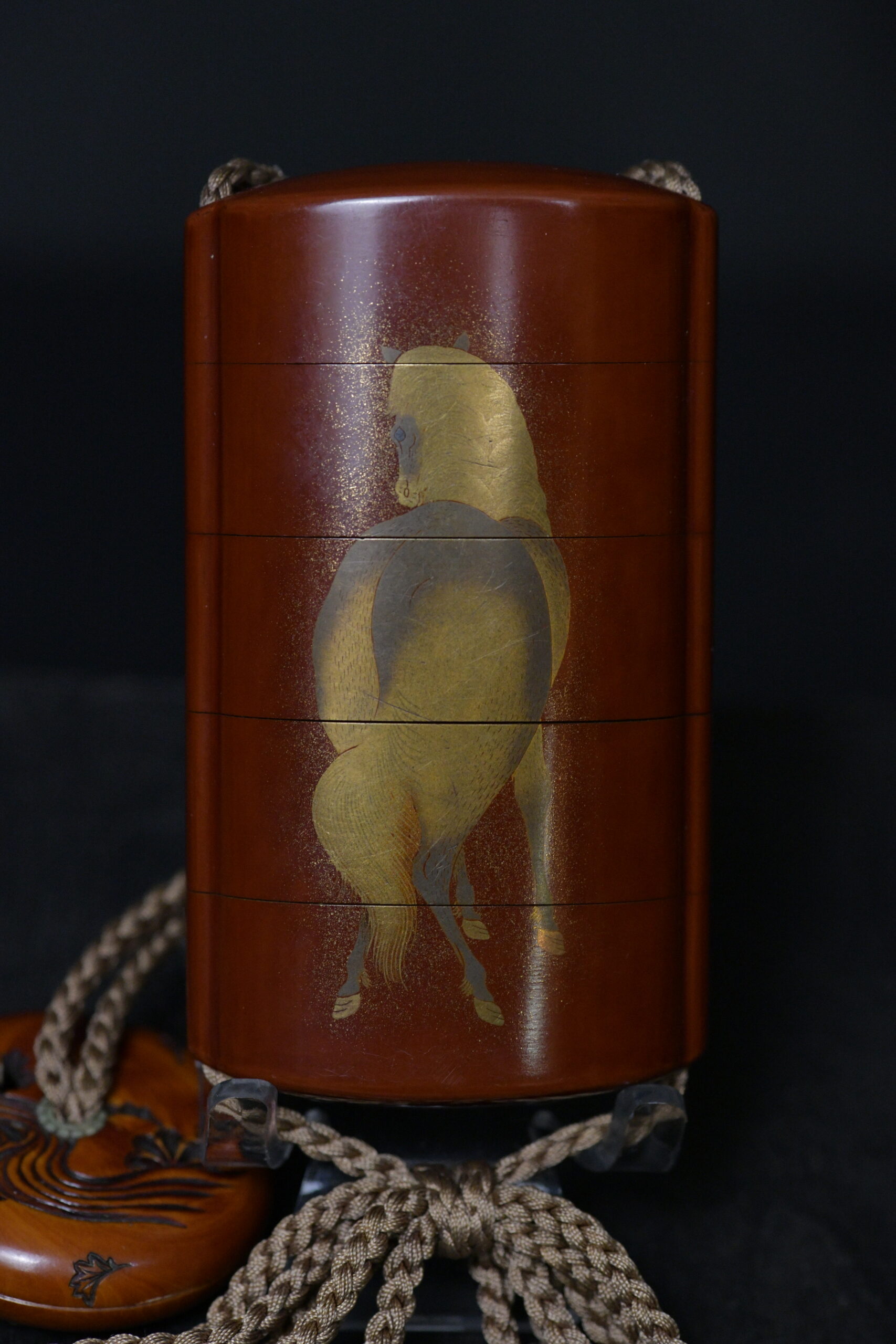 Inro Red lacquer horse