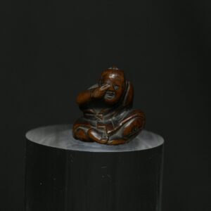 Netsuke man eye wood