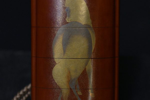 Inro Red lacquer horse