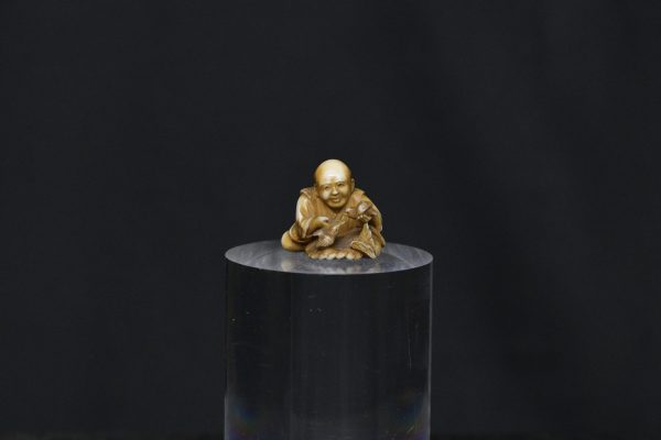 Netsuke Elder and bird ivory