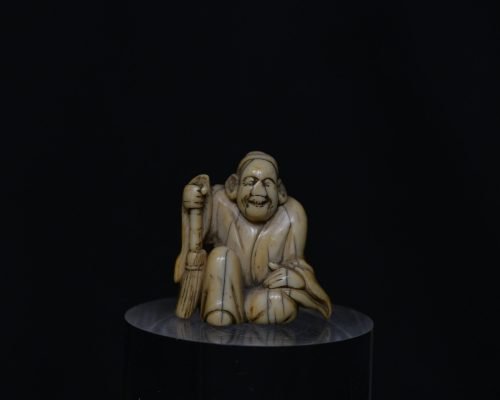 Netsuke Elder seal ivory